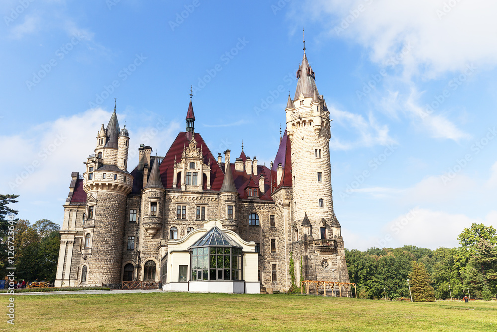 Fototapeta premium View on 17 th century Moszna Castle on a sunny day, Poland
