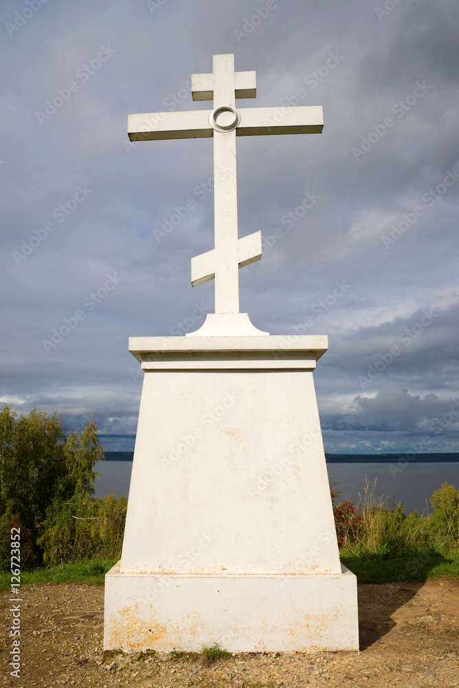 A memorable cross on the mountain Baltschug close up in the cloudy September afternoon. Kostroma region A memorable cross on the mountain Baltschug close up in the cloudy September afternoon. Kostroma region