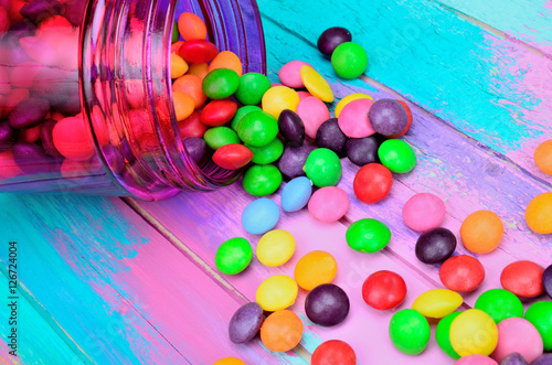 candy in jar flow on table