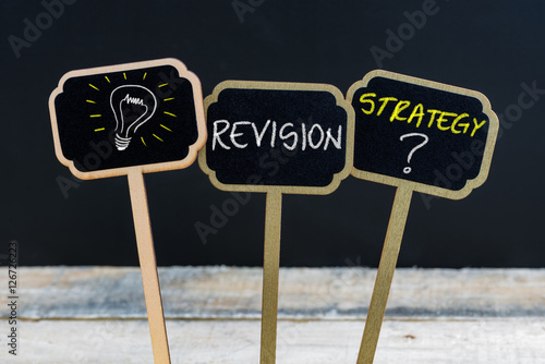Photography Concept message REVISION STRATEGY ? and light bulb as symbol for idea
