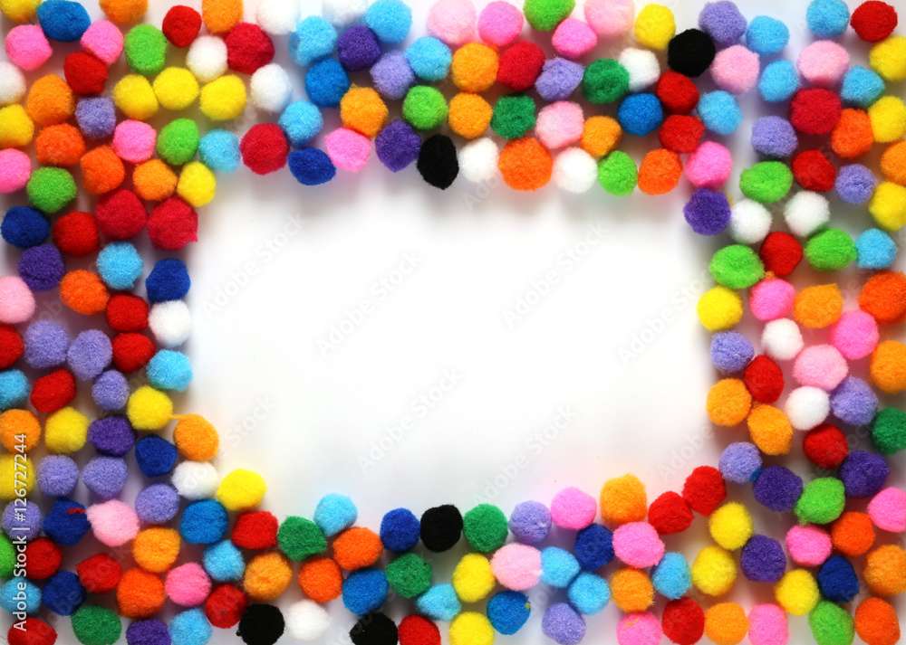 frame of small colored pompons isolated on white 2 frame of small colored pompons isolated on white 2