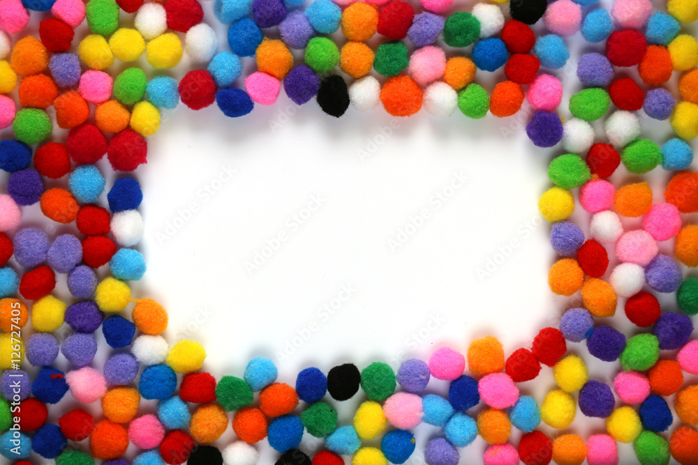 frame of small colored pompons isolated on white 1 frame of small colored pompons isolated on white 1
