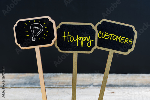 Concept message Happy Customers and light bulb as symbol for idea