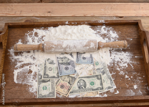 Roll of dollaes flour.