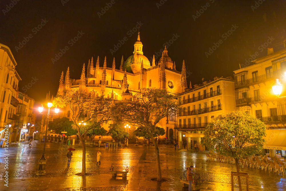 Square with cathedral by night