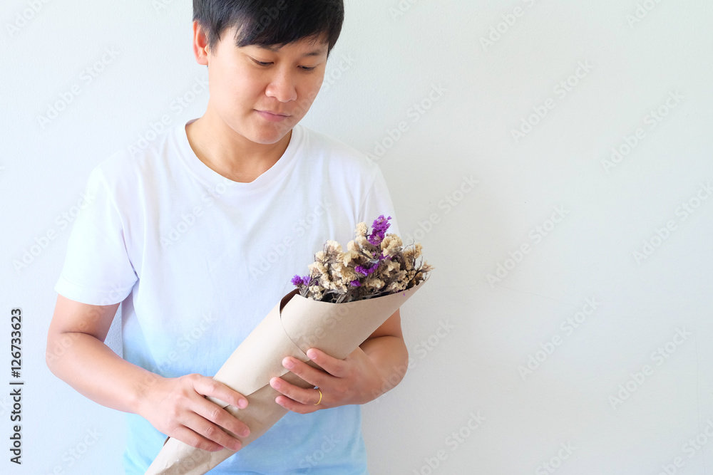 Limonium sinuatum Statice Salem flower in hand isolated on white Limonium sinuatum Statice Salem flower in hand isolated on white