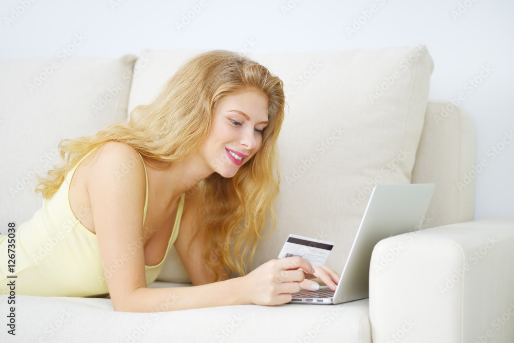 Girl with laptop and credit card Girl with laptop and credit card