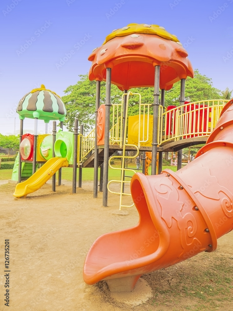 Colorful playground with blue sky background