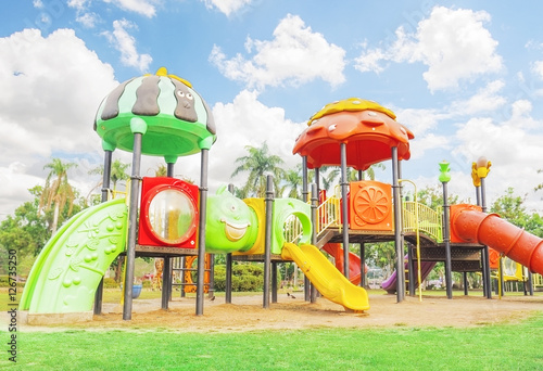 Colorful playground with blue sky background