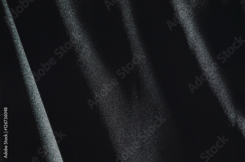 black fabric in shadow background and texture photo