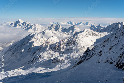 Skiing and Snowboarding in the winterly Stubai Alps