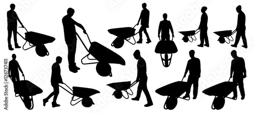 People with wheelbarrow silhouettes photo
