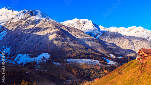autumn sunset in the alpine valley