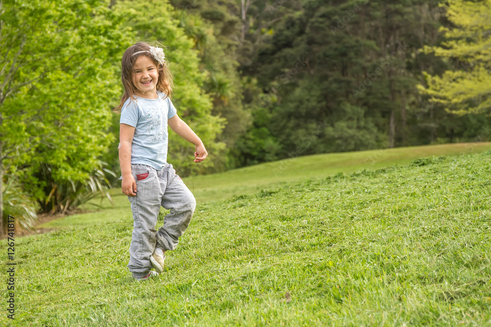 outdoor portrait of young happy child girl on natural background outdoor portrait of young happy child girl on natural background