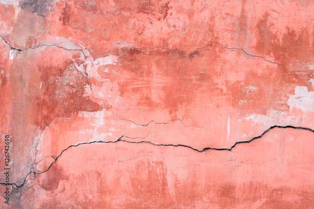 Fotografie plastered wall with peeling plaster with huge crack
