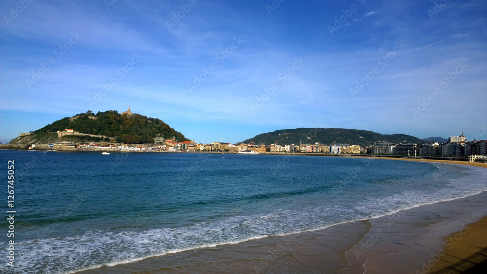 View of La Concha beach in San Sebastian, Spain. It is one of the most famous urban beaches in Spain.