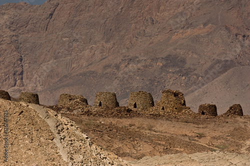 Ancient beehive tombs of Oman photo