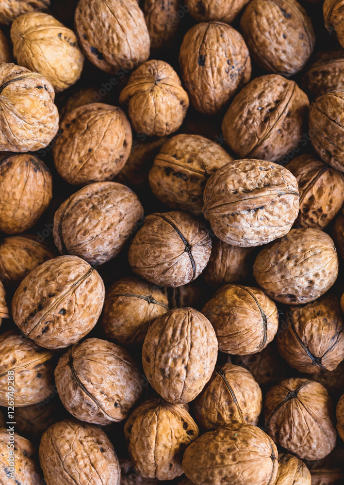 Whole walnuts background. Close up, top view. Whole walnuts background. Close up, top view.