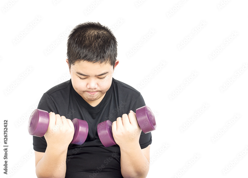 14 years old Asian boy is lifting dumbbell isolated over white