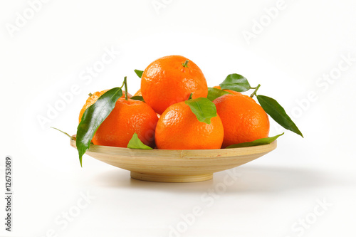 plate of ripe mandarin oranges