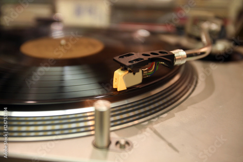Turntable in action with focus on the cartridge