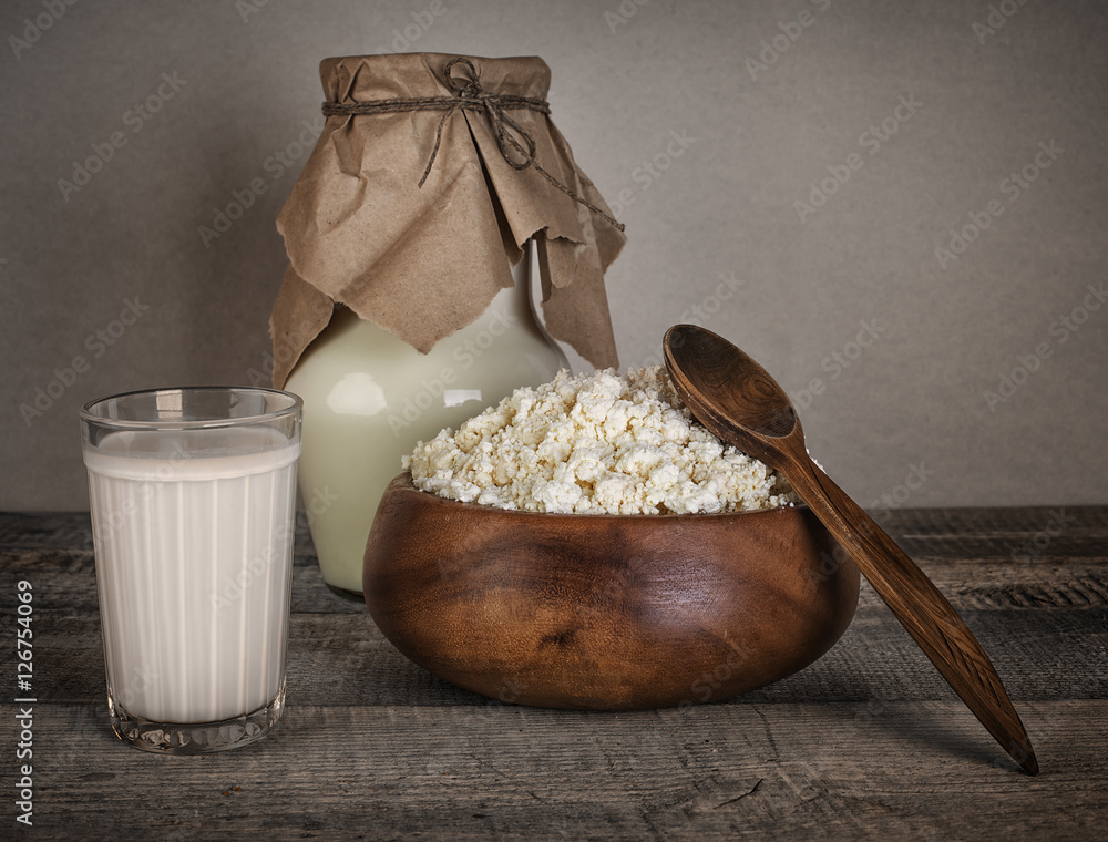 glass of milk, cottage cheese fresh homemade bread with solt on