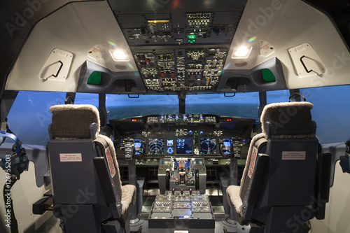 Fotografija Cockpit of plane in flight simulator