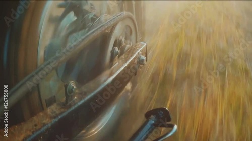 Offroad bike riding on dirt track rear wheel point of view