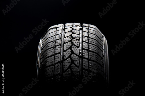 Obraz na płótnie Black car tire w salonie