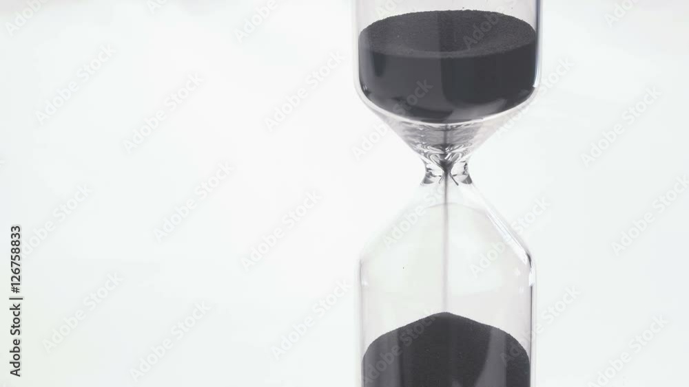 Sand flows through an hourglass. For concepts such as time, watch Sand flows through an hourglass. For concepts such as time, watch