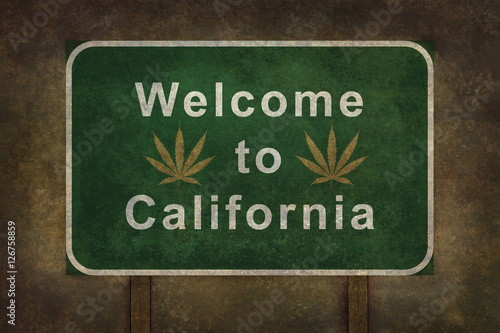 Welcome to California with marijuana leaf symbol roadside sign