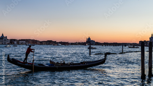 Gondola by night in front of the Saint Marco Square in Venice It