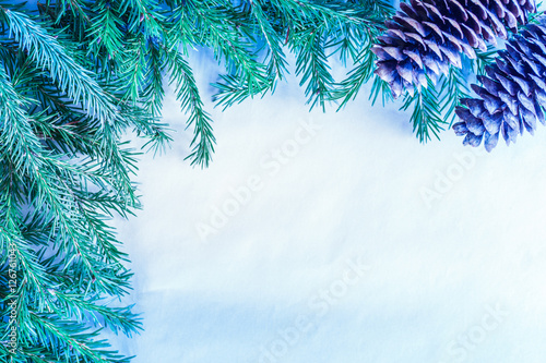 Fototapet Christmas background with evergreen firtree branch