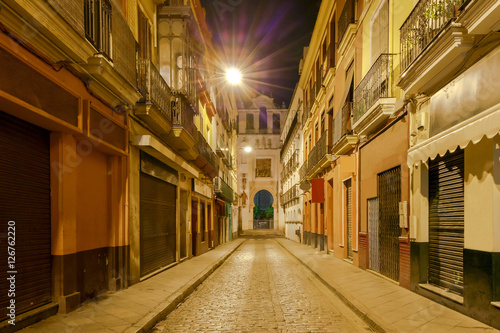 Sevilla. Old street at night.