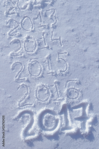 new years date 2017 written in fresh powder snow