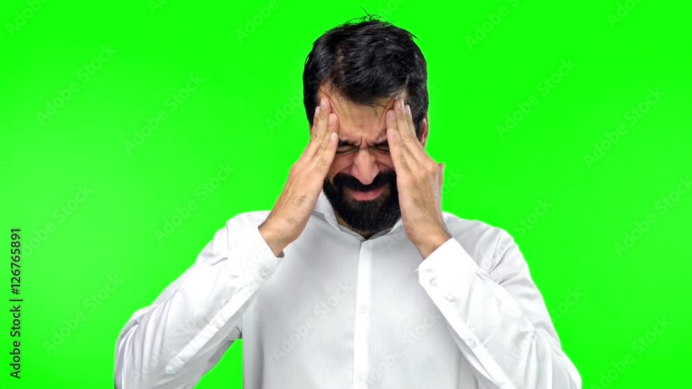 Frustrated handsome man on green screen chroma key Frustrated handsome man on green screen chroma key