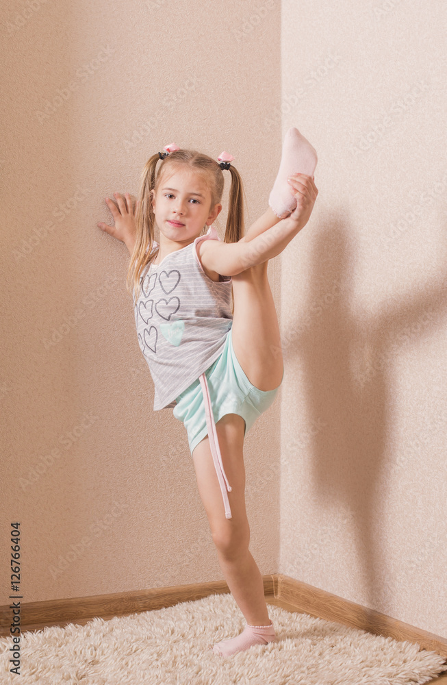 girl doing gymnastics at home girl doing gymnastics at home