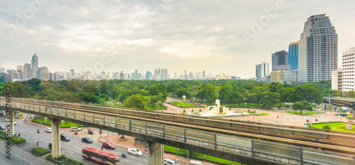 Panorama Bangkok City with electric Sky train rail On Top of the road