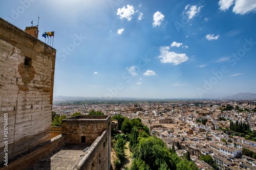 Panoramic view, cityscape of Granada city with the walls of Alhambra Alcazaba, Andalucia, Spain 