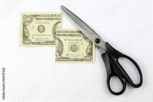 Cut dollars with scissors