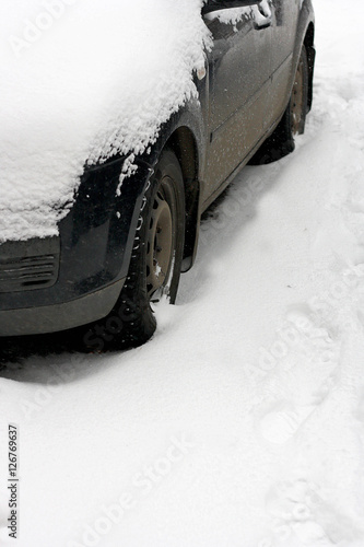 Car under the snow.