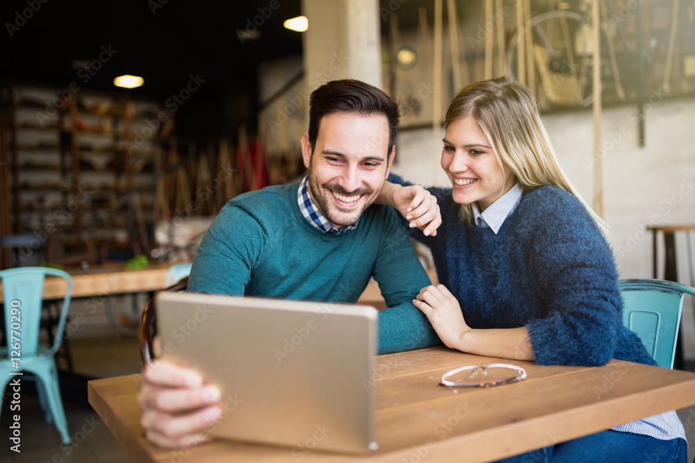 Couple taking selfie in restaurant Couple taking selfie in restaurant