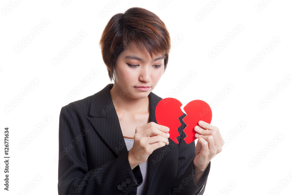 Beautiful young Asian woman with broken heart. Beautiful young Asian woman with broken heart.