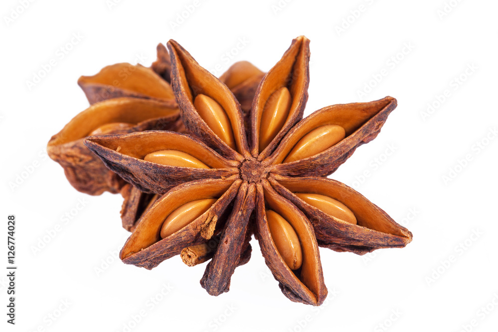 Stars of dried anise (Illicium verum) isolated on white background