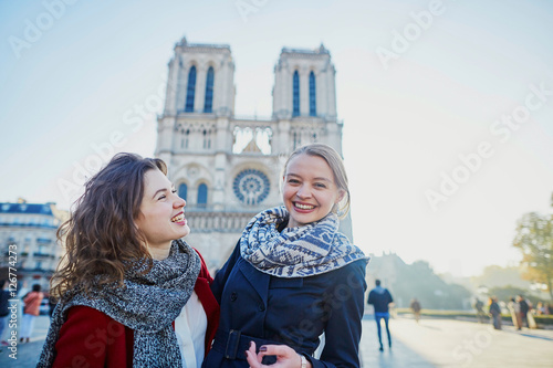 Photography Two young girls near Notre-Dame in Paris
