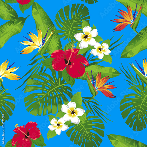 Tropical flowers and leaves on blue background. Seamless. Vector.