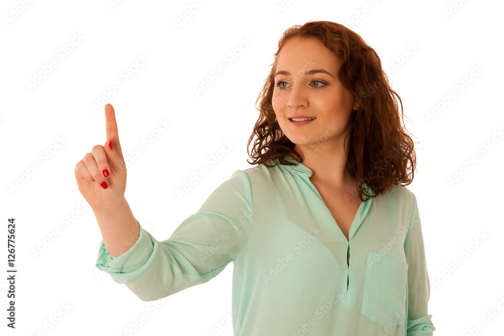 Business woman pointing to copy space while presenting a product Business woman pointing to copy space while presenting a product