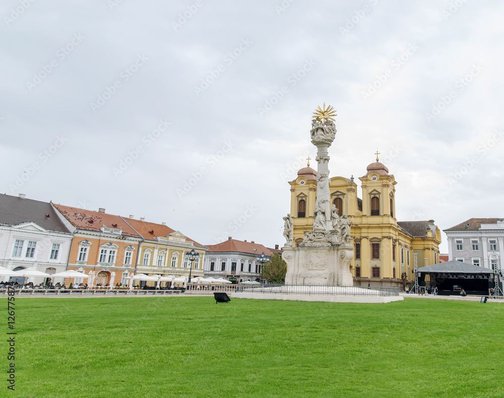 TIMISOARA, ROMANIA - 15 OCTOBER, 2016 Detail of the Holy Trinity Statue at Union square and Roman Catholic Episcopal Church