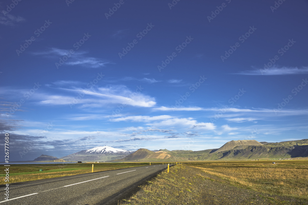 Isolated road to Snaefellsjoekull mountain at Iceland, summer ti