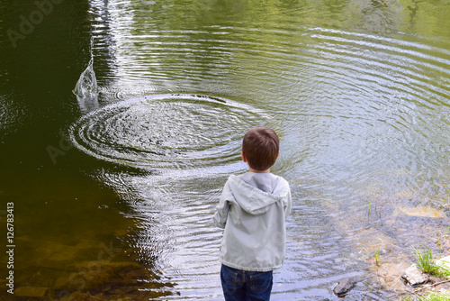Little boy near the water
